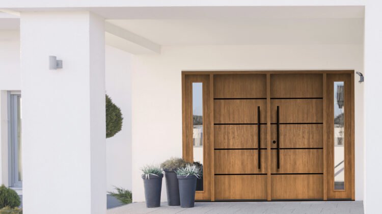 MASTERGRAIN fiberglass door in Cherry, Contemporary Stainless Inlay in Tea with Milk stain by Sherwin Williams.